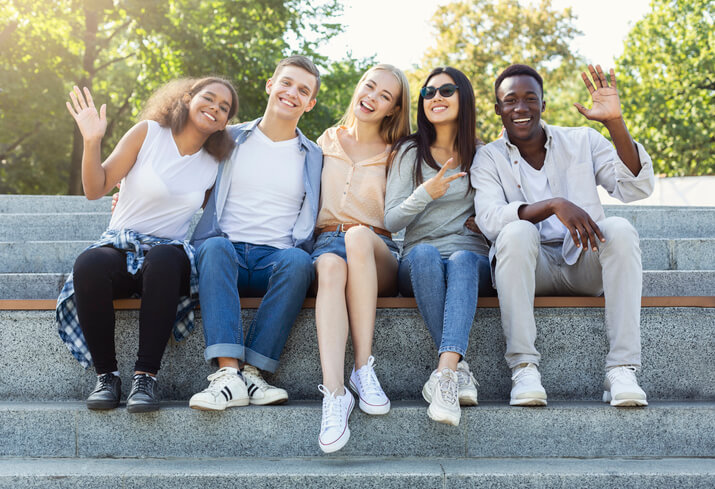 Happy friends spending time together in the city